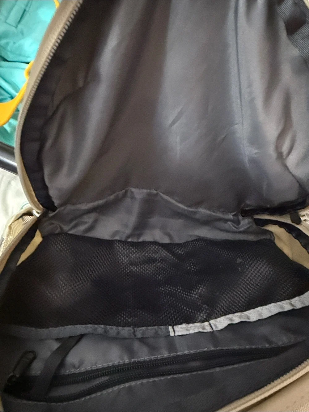 The North Face Cream Backpack with Mint Bungee Cord